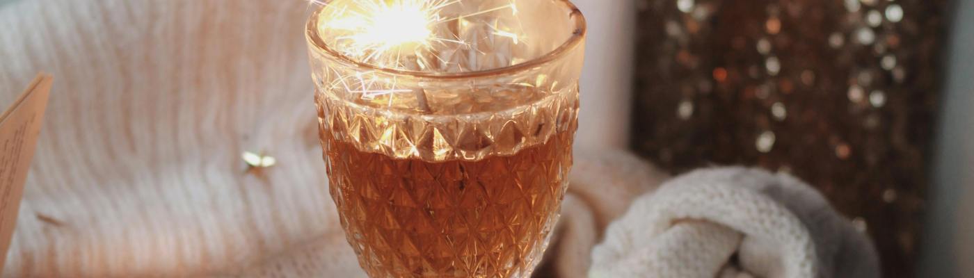 Photo by Ioana Motoc: https://www.pexels.com/photo/drink-in-a-glass-with-lit-sparkles-on-a-coffee-table-19149206/