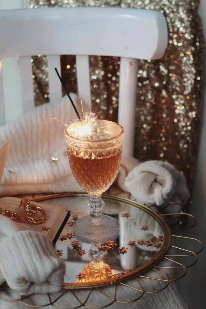Photo by Ioana Motoc: https://www.pexels.com/photo/drink-in-a-glass-with-lit-sparkles-on-a-coffee-table-19149206/